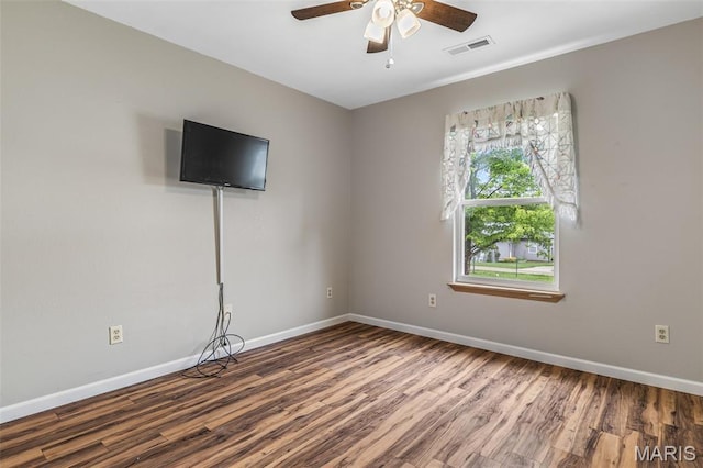 310 S Harry Junior St, Desloge, MO 63601 - spare room featuring wood finished floors, baseboards, and a ceiling fan