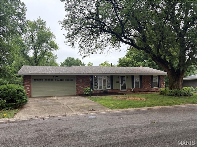 410 Willowbrook Ln, Collinsville, IL 62234 - ranch-style house featuring a garage, brick siding, concrete driveway, and a front lawn