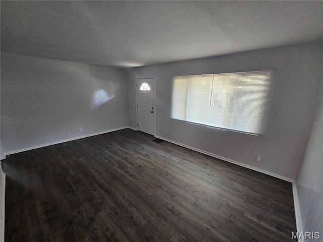 1150 Lilac Dr, Belleville, IL 62220 - entrance foyer with dark wood finished floors and baseboards
