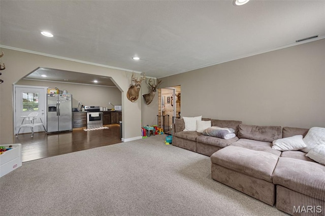 14864 S State Highway 21, Potosi, MO 63664 - living area featuring dark carpet, arched walkways, ornamental molding, recessed lighting, and baseboards