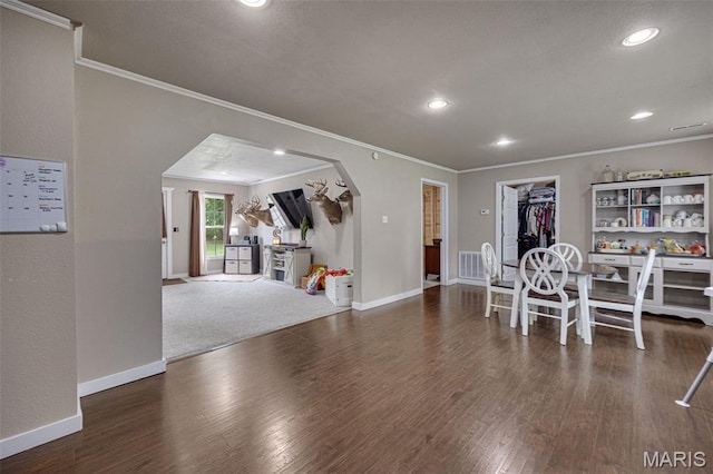 14864 S State Highway 21, Potosi, MO 63664 - dining space featuring crown molding, wood finished floors, arched walkways, recessed lighting, and baseboards
