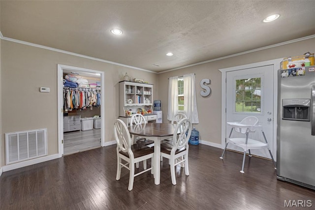 14864 S State Highway 21, Potosi, MO 63664 - dining area featuring crown molding, recessed lighting, baseboards, dark wood-style floors, and a textured ceiling