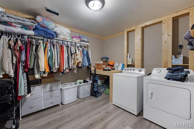 14864 S State Highway 21, Potosi, MO 63664 - laundry room with washing machine and clothes dryer and light wood finished floors