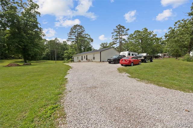 14864 S State Highway 21, Potosi, MO 63664 - view of front of home with driveway, a front lawn, and view of wooded area