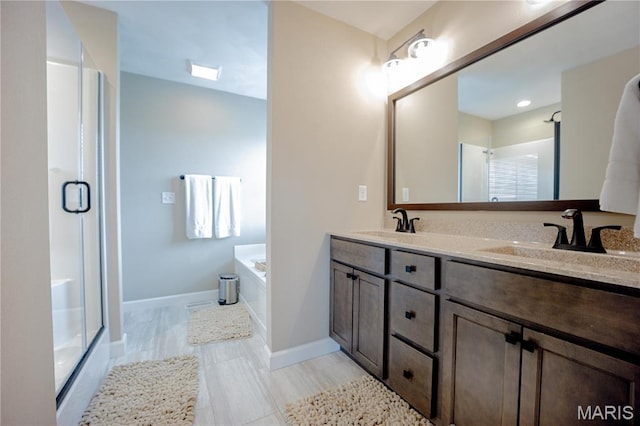 3432 Navajo Trl, Shiloh, IL 62221 - bathroom with a shower stall, double vanity, and a bath