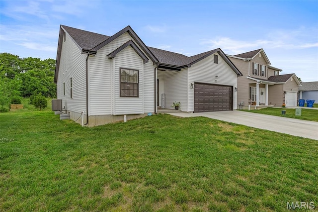 view of front of property with concrete driveway, a front yard, an attached garage, central AC unit, and a shingled roof