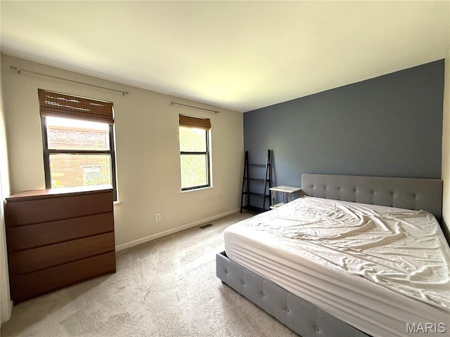 4333 Laclede Ave Unit D, Saint Louis, MO 63108 - bedroom with light carpet and baseboards