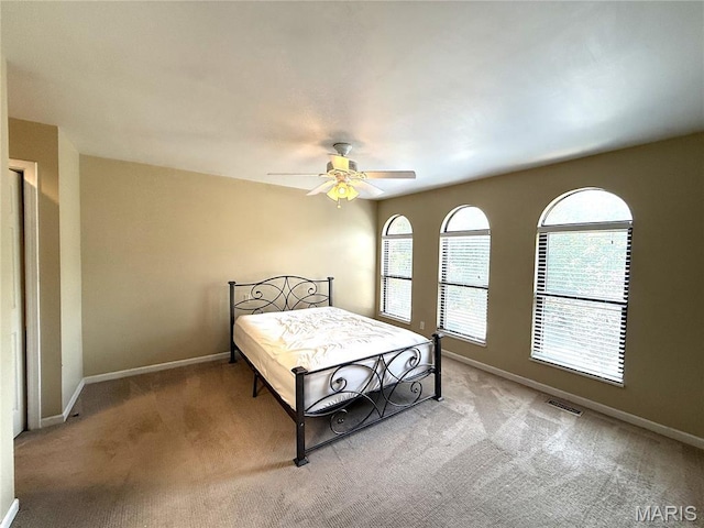 4333 Laclede Ave Unit D, Saint Louis, MO 63108 - bedroom featuring light carpet, baseboards, and ceiling fan