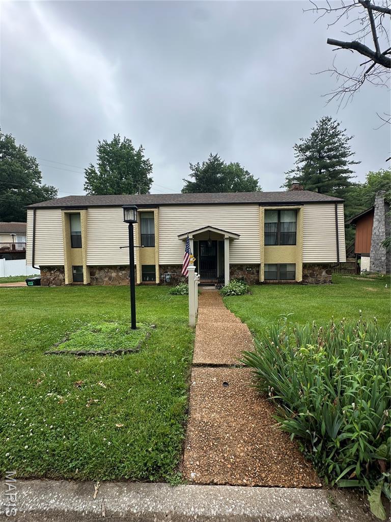 305 Berkshire Dr, Belleville, IL 62223 - view of front facade with a front lawn and stone siding
