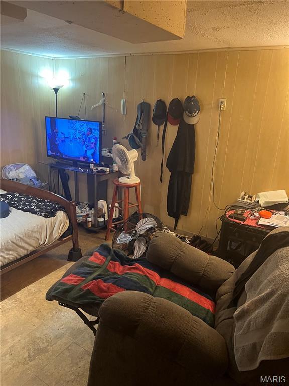 8362 Braddock Dr, University City, MO 63132 - bedroom with wooden walls