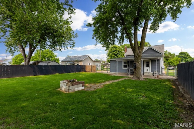 311 S Edwardsville St, Staunton, IL 62088 - fenced backyard featuring a patio area