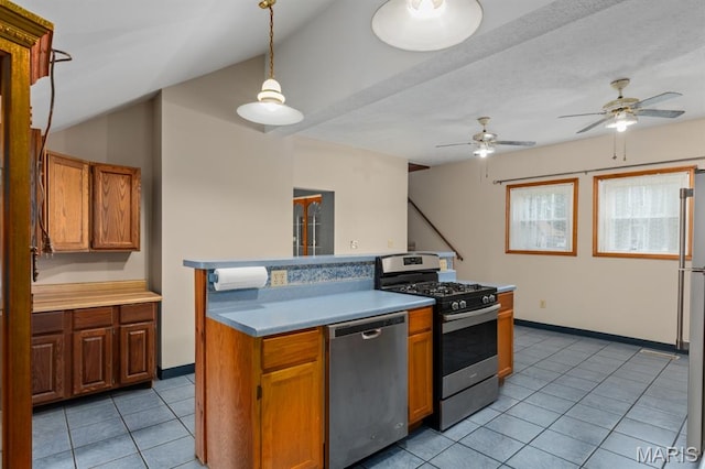 311 S Edwardsville St, Staunton, IL 62088 - kitchen with stainless steel appliances, light tile patterned flooring, a ceiling fan, light countertops, and decorative light fixtures