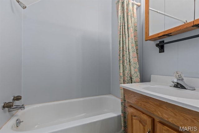 311 S Edwardsville St, Staunton, IL 62088 - bathroom featuring shower / bath combo with shower curtain and vanity