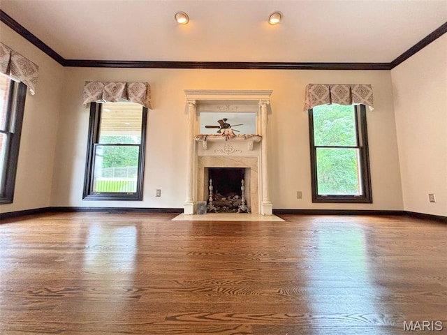 512 Overlook Terrace Ct, Eureka, MO 63025 - unfurnished living room featuring plenty of natural light, wood finished floors, a high end fireplace, and crown molding
