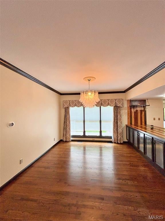 512 Overlook Terrace Ct, Eureka, MO 63025 - unfurnished living room featuring ornamental molding, a chandelier, and wood finished floors