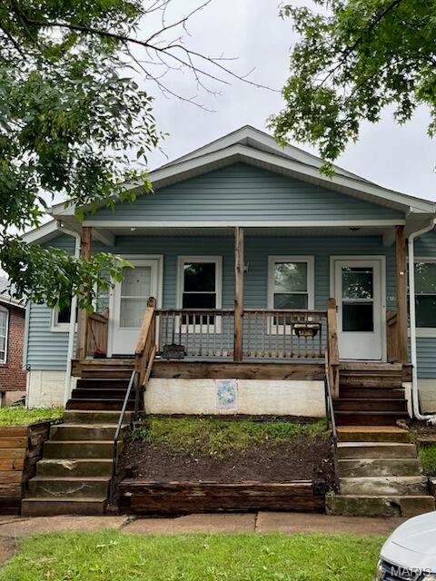 4106 Wilmington Ave Unit 4106And 4108, Saint Louis, MO 63116 - view of front of home with stairs and a porch