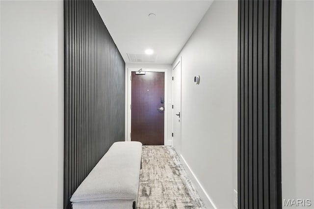 314 N Broadway Unit 806, Saint Louis, MO 63102 - corridor with attic access, baseboards, and carpet floors
