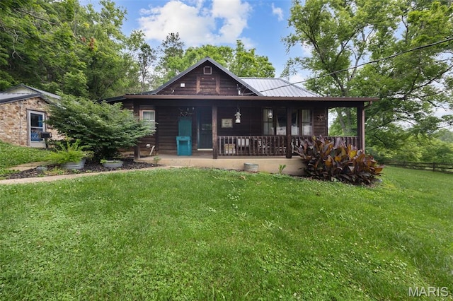 19185 Highway Hwy, Arcadia, MO 63621 - view of front of house with a front lawn, a porch, and metal roof