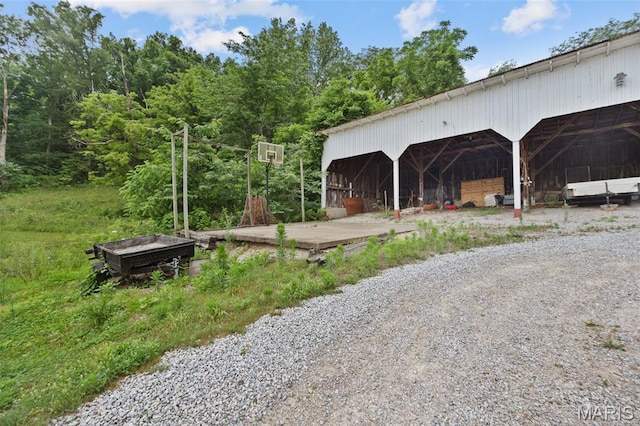 19185 Highway Hwy, Arcadia, MO 63621 - view of pole building with gravel driveway and a carport