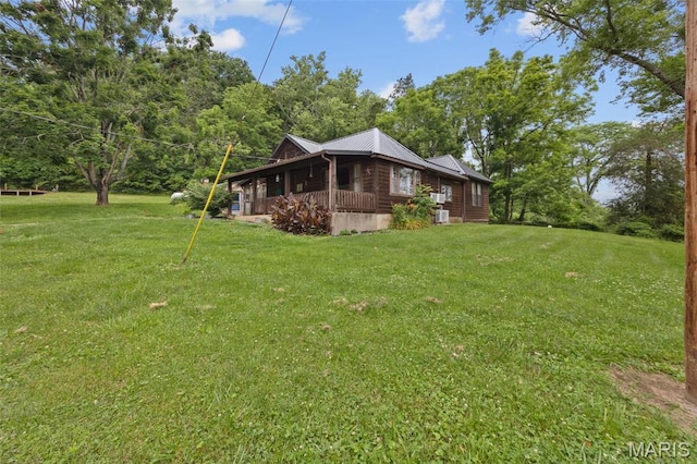 19185 Highway Hwy, Arcadia, MO 63621 - view of side of property featuring a yard and metal roof
