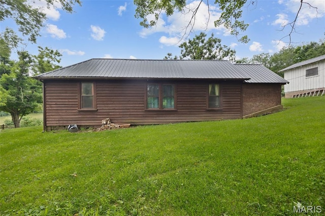 19185 Highway Hwy, Arcadia, MO 63621 - view of property exterior with a yard and metal roof