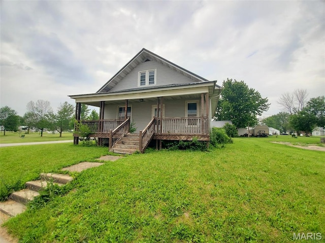 201 E Main St, Lewistown, MO 63452 - view of front of house with a front lawn and covered porch