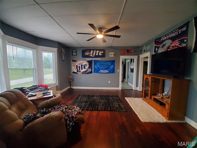 201 E Main St, Lewistown, MO 63452 - living room featuring a ceiling fan, wood finished floors, and baseboards