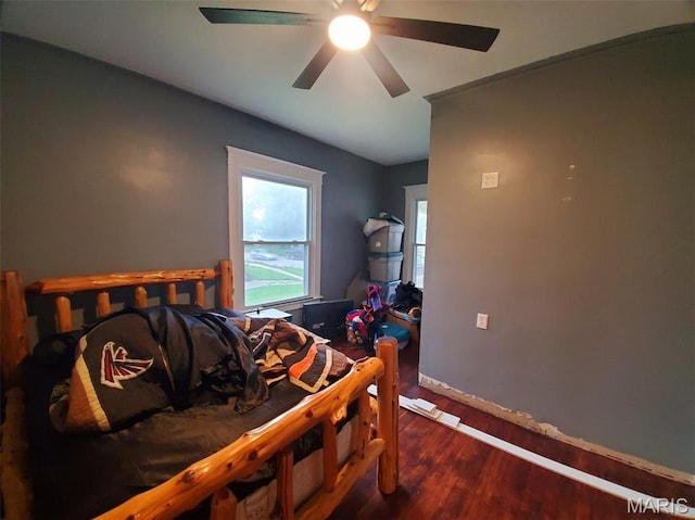 201 E Main St, Lewistown, MO 63452 - bedroom with wood finished floors, a ceiling fan, and baseboards