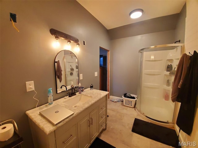 201 E Main St, Lewistown, MO 63452 - bathroom featuring a shower stall, vanity, and lofted ceiling
