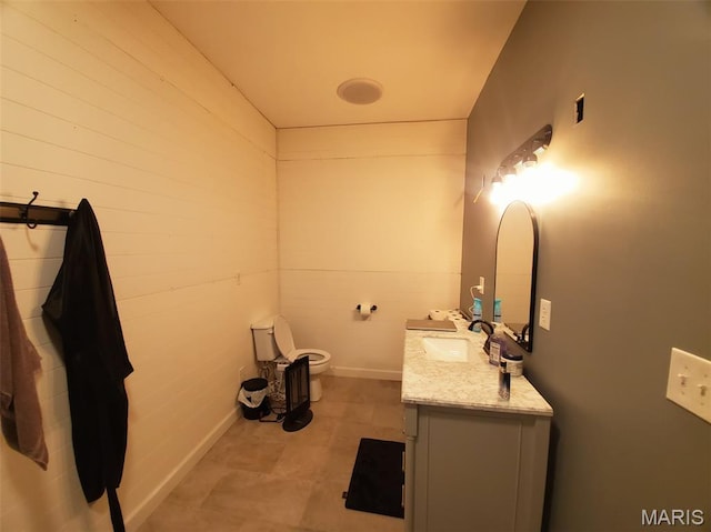 201 E Main St, Lewistown, MO 63452 - bathroom with vanity, toilet, and baseboards