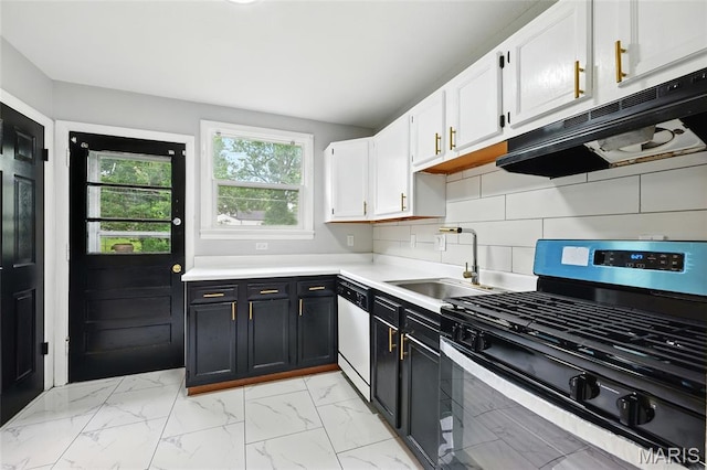 1005 Edgehill Dr, Ferguson, MO 63135 - kitchen featuring gas stove, dishwashing machine, ventilation hood, dark cabinetry, and light countertops