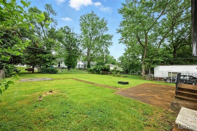 1005 Edgehill Dr, Ferguson, MO 63135 - view of yard featuring a deck