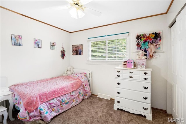 1910 Flamingo Dr, Florissant, MO 63031 - carpeted bedroom with a closet, crown molding, and a ceiling fan