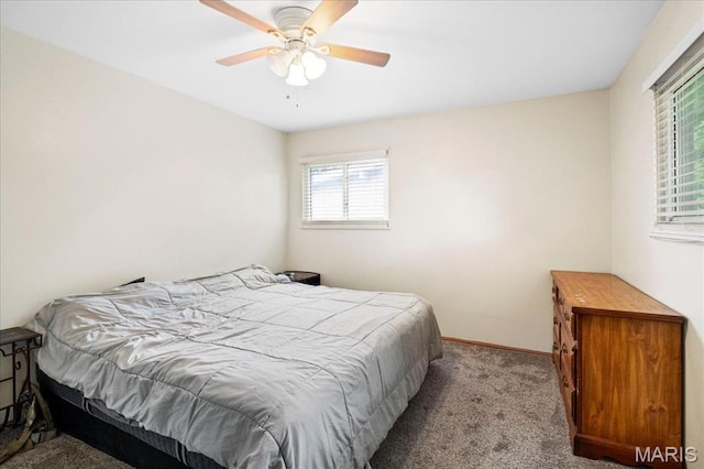 1910 Flamingo Dr, Florissant, MO 63031 - carpeted bedroom with baseboards and ceiling fan