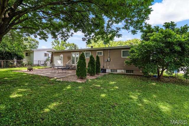 1910 Flamingo Dr, Florissant, MO 63031 - rear view of property with a patio area and entry steps