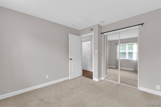 9179 N Swan Cir, Brentwood, MO 63144 - unfurnished bedroom featuring carpet flooring, a closet, and baseboards