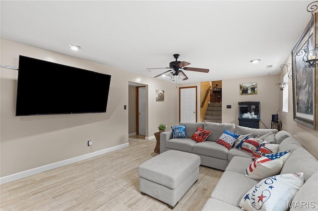 818 Sheraton Ln, Herculaneum, MO 63048 - living area with stairway, ceiling fan, light wood-type flooring, baseboards, and recessed lighting