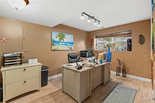 818 Sheraton Ln, Herculaneum, MO 63048 - office area with baseboards, wood finish floors, and track lighting