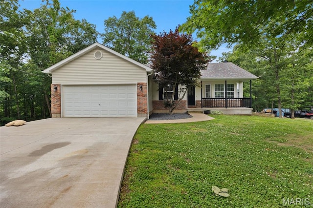 10041 Fox Haven Rd, Blackwell, MO 63626 - single story home with driveway, a porch, a garage, brick siding, and a front lawn