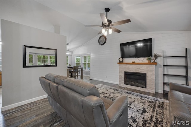 10041 Fox Haven Rd, Blackwell, MO 63626 - living room featuring wood finished floors, baseboards, vaulted ceiling, a ceiling fan, and a stone fireplace