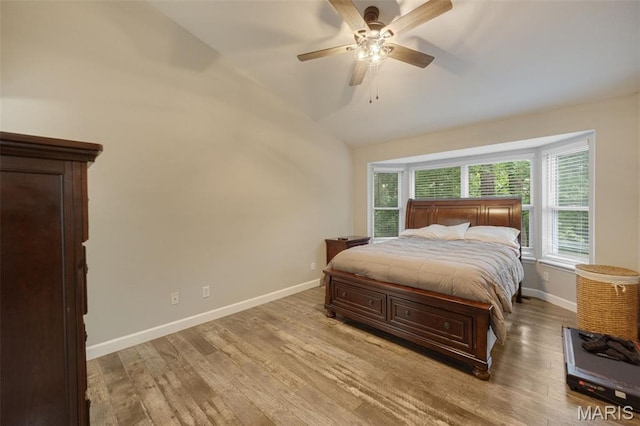 10041 Fox Haven Rd, Blackwell, MO 63626 - bedroom with baseboards, light wood-style flooring, lofted ceiling, and ceiling fan
