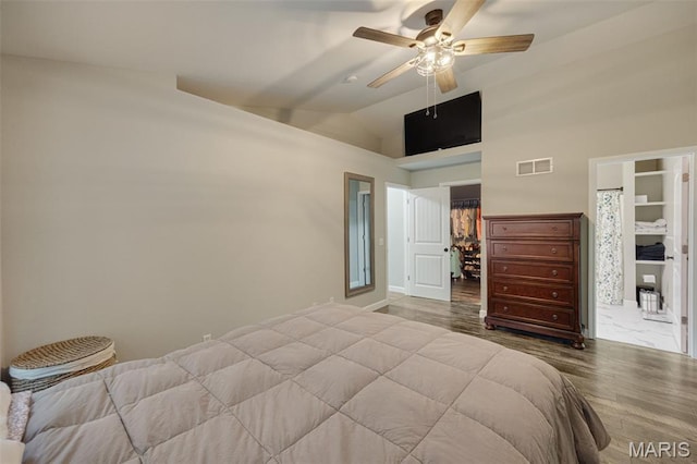 10041 Fox Haven Rd, Blackwell, MO 63626 - bedroom with wood finished floors, vaulted ceiling, ceiling fan, ensuite bath, and baseboards