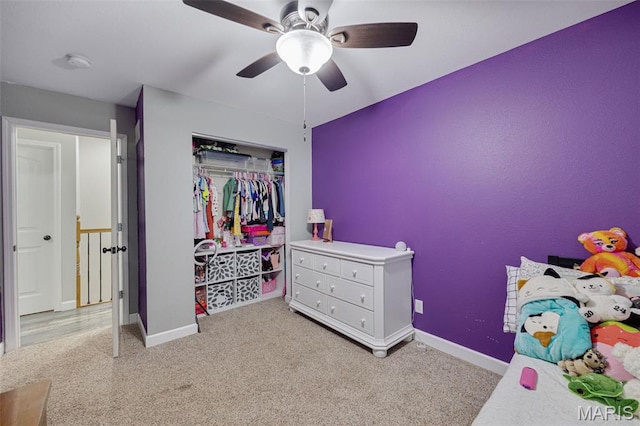 10041 Fox Haven Rd, Blackwell, MO 63626 - bedroom with carpet flooring, baseboards, a closet, and a ceiling fan