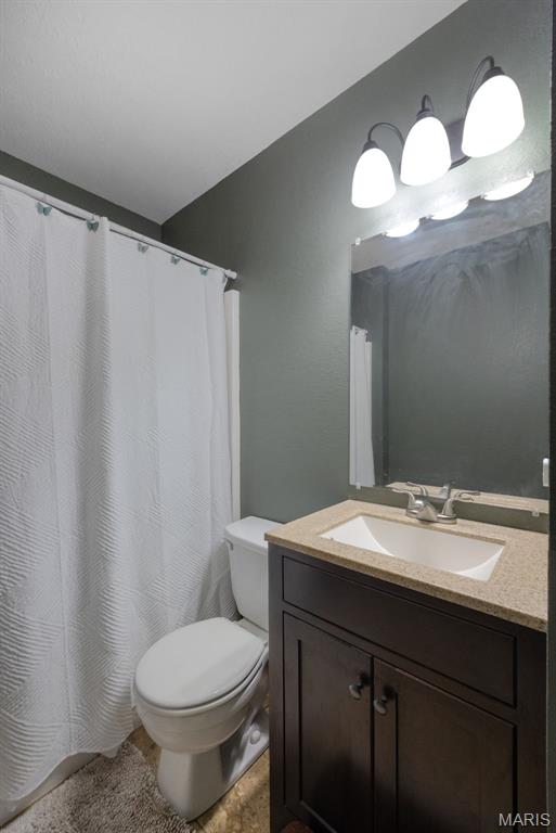 10041 Fox Haven Rd, Blackwell, MO 63626 - full bath featuring vanity and toilet