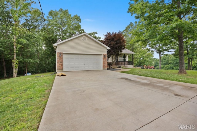 10041 Fox Haven Rd, Blackwell, MO 63626 - view of front facade featuring concrete driveway, a front yard, brick siding, a garage, and covered porch