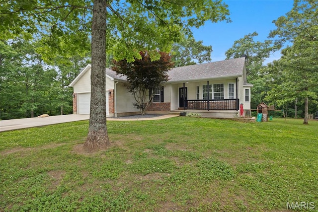 10041 Fox Haven Rd, Blackwell, MO 63626 - view of front of house with a porch, a front lawn, concrete driveway, a garage, and a playground