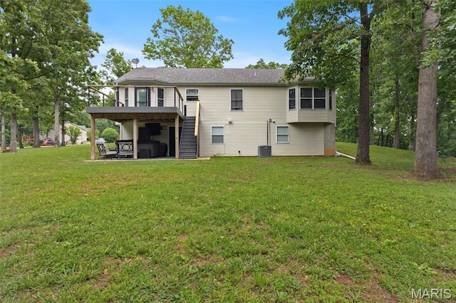 10041 Fox Haven Rd, Blackwell, MO 63626 - rear view of house with stairs, a wooden deck, and a yard