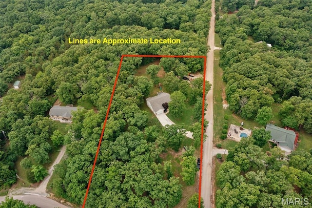 10041 Fox Haven Rd, Blackwell, MO 63626 - aerial view of property and surrounding area with a heavily wooded area and property parcel outlined