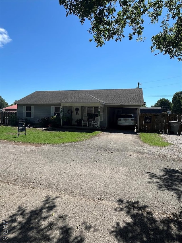 1600 Jennifer Ln, Kennett, MO 63857 - ranch-style house featuring a garage and driveway