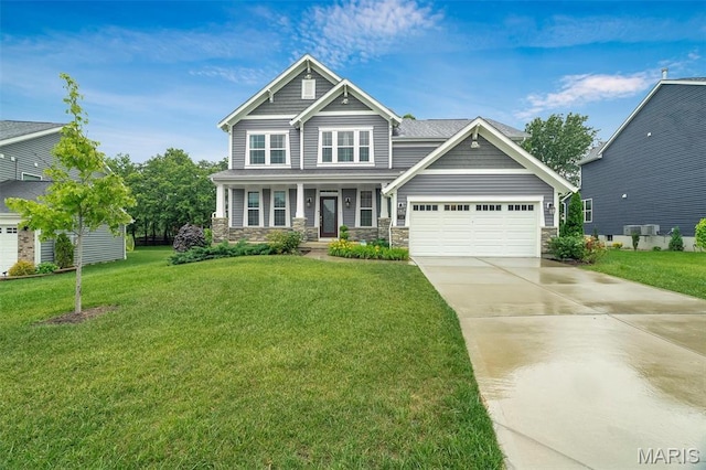 708 Kenmare Ct, Ofallon, MO 63368 - craftsman house featuring stone siding, a porch, driveway, and a front lawn